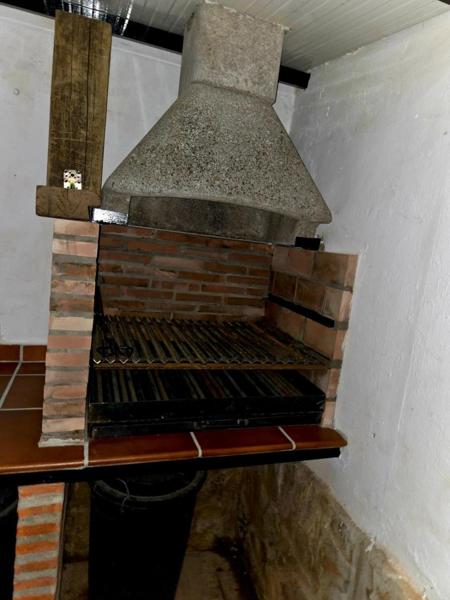Barbacoa de obra con campana